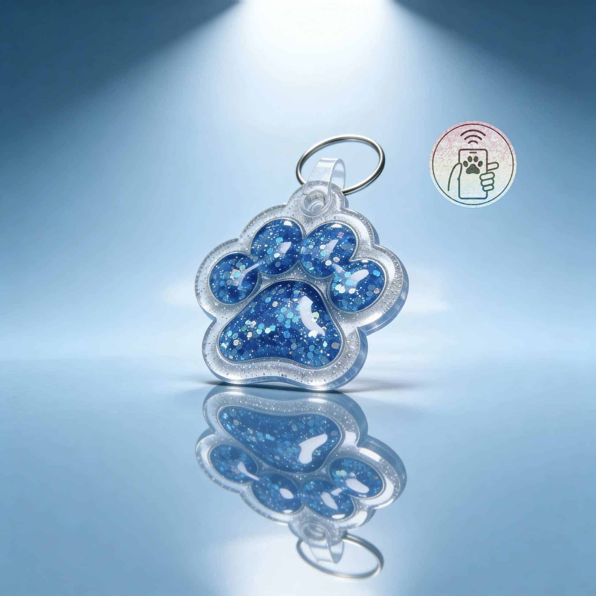 Stylish blue glitter pet ID tag shaped like a paw for dogs and cats.