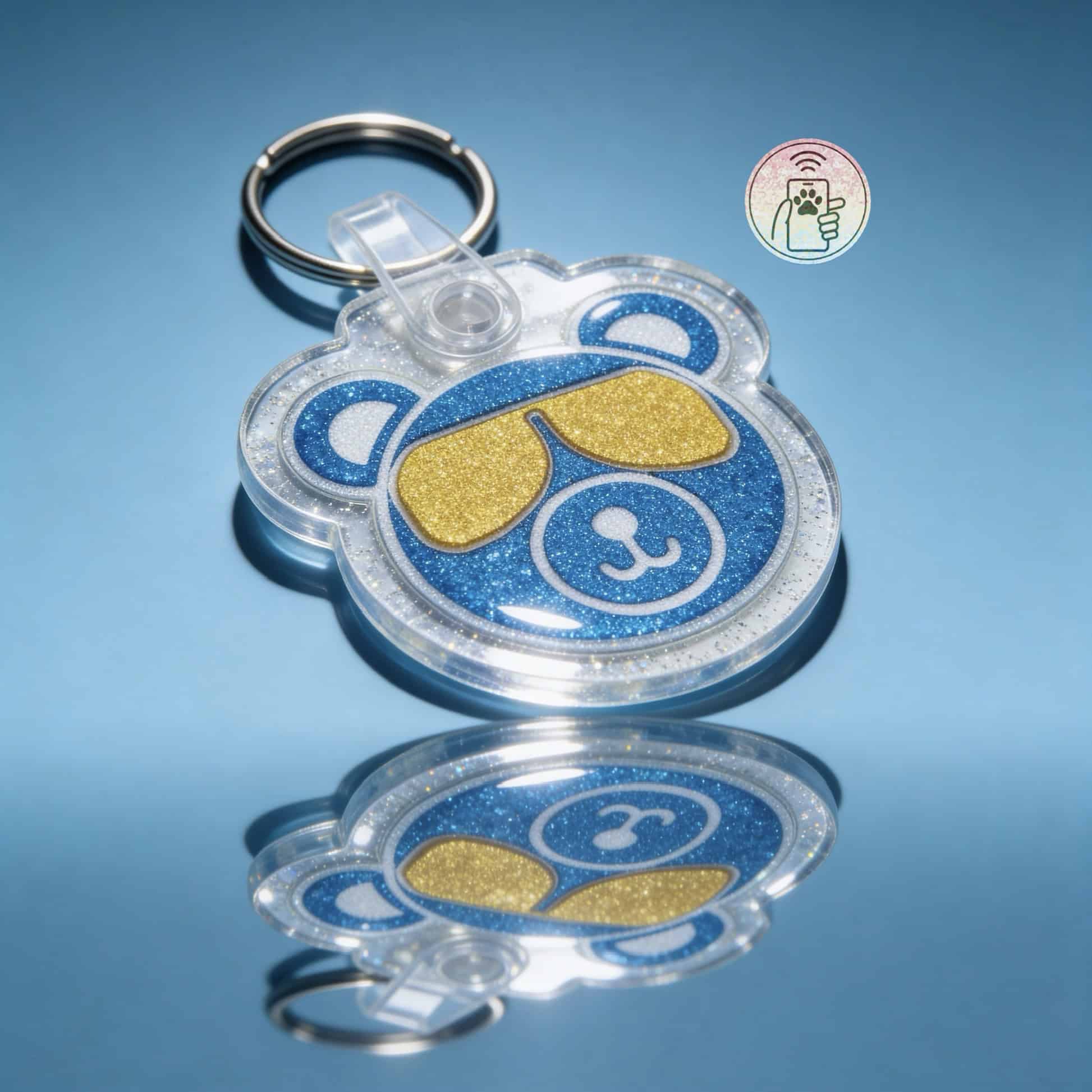 NFC pet ID tag shaped like a bear with glittery blue and gold acrylic, keyring included.