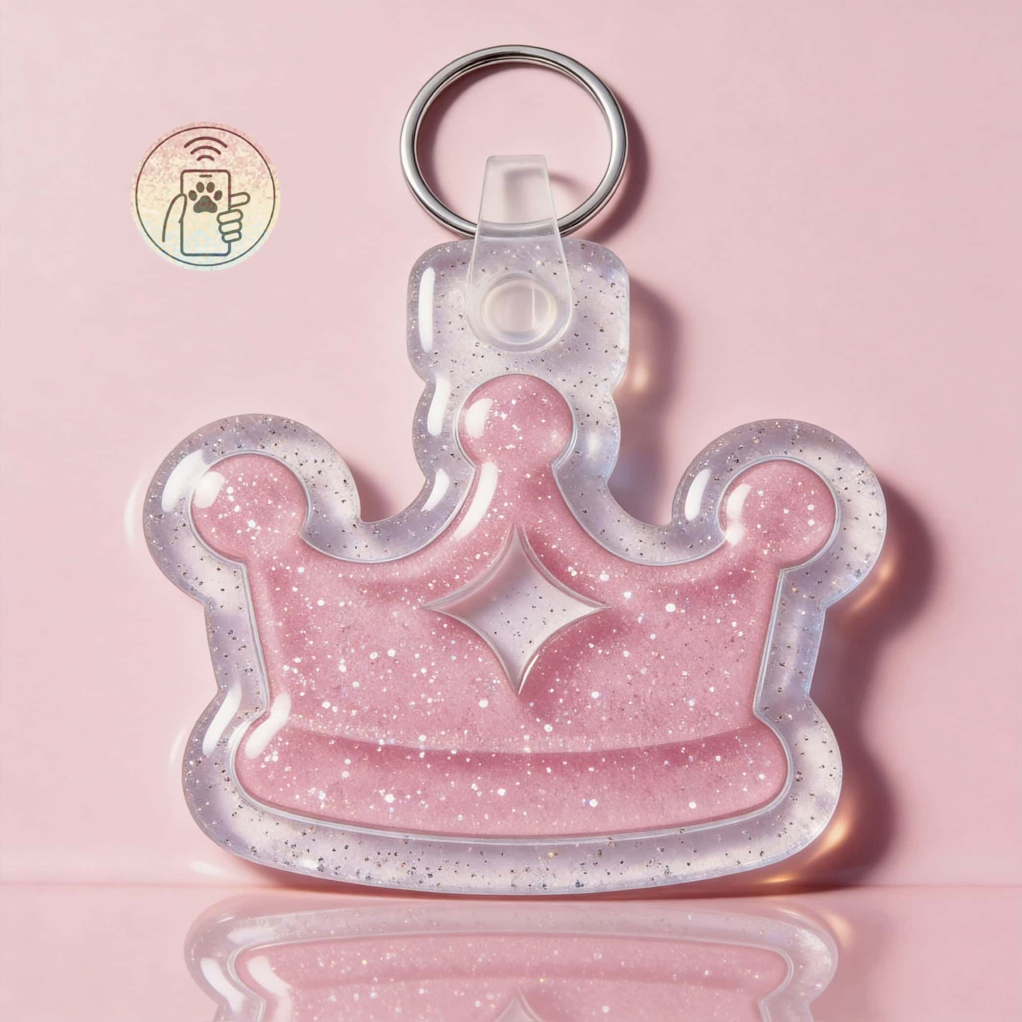 Glittery pink crown-shaped NFC pet ID tag for dogs and cats.