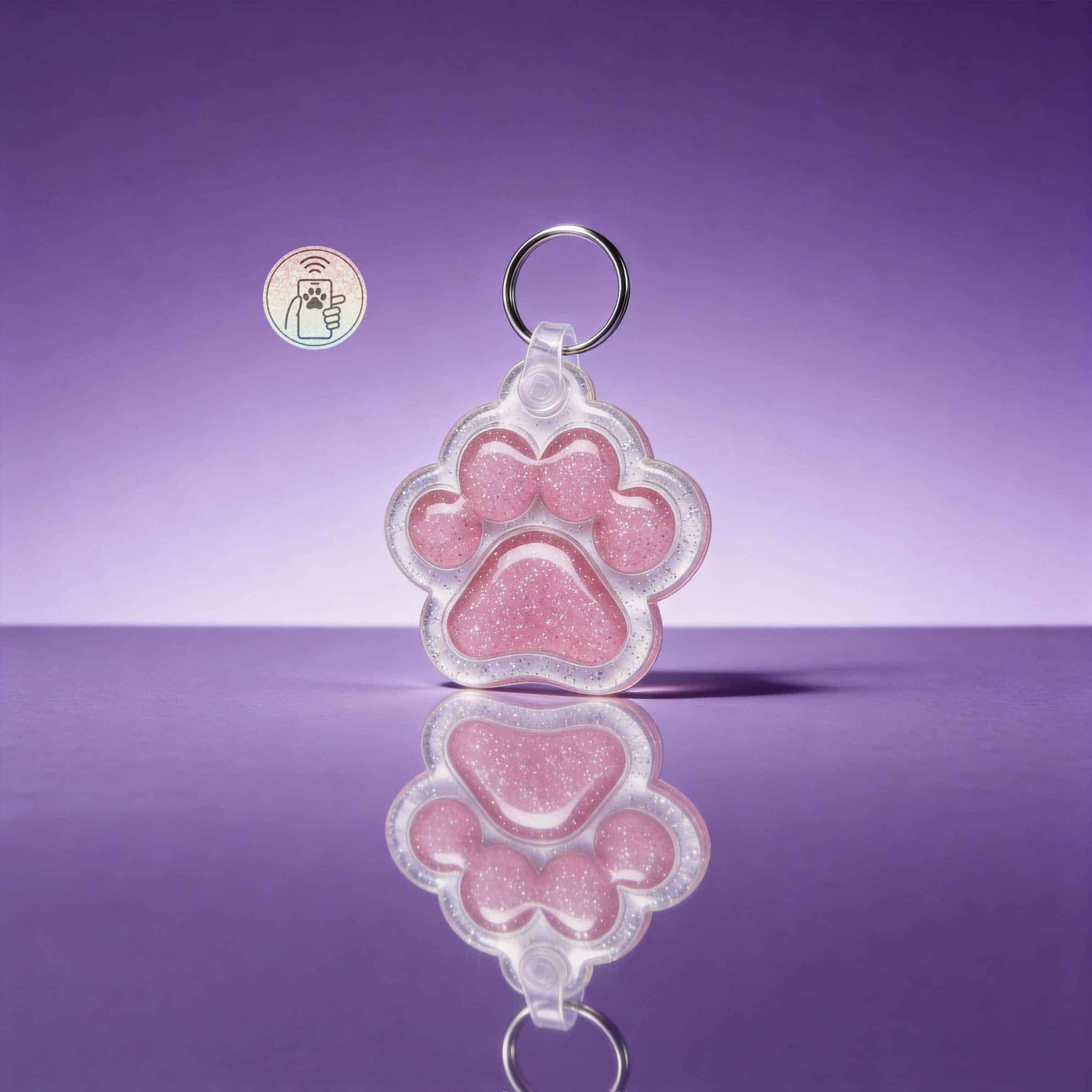 Pink paw-shaped NFC pet ID tag with glitter, designed for dogs and cats.