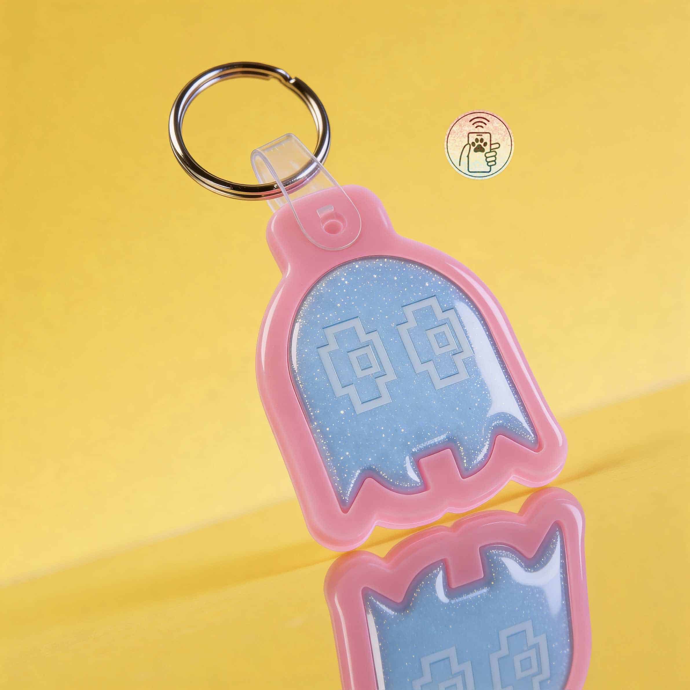 NFC pet ID tag in ghost shape with reflective surface for dogs and cats.