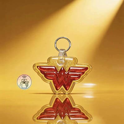 Designer Wonder Woman shield-shaped NFC pet ID tag for dogs and cats.