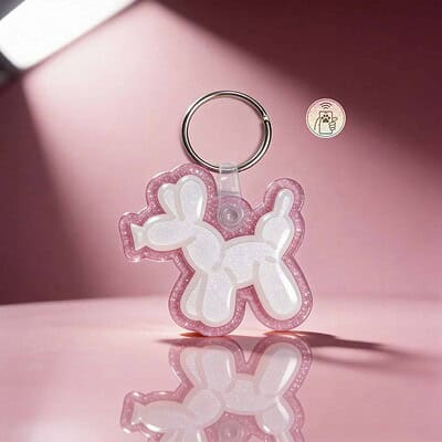 Pink bunny-shaped NFC pet ID tag for dogs and cats with glitter finish.