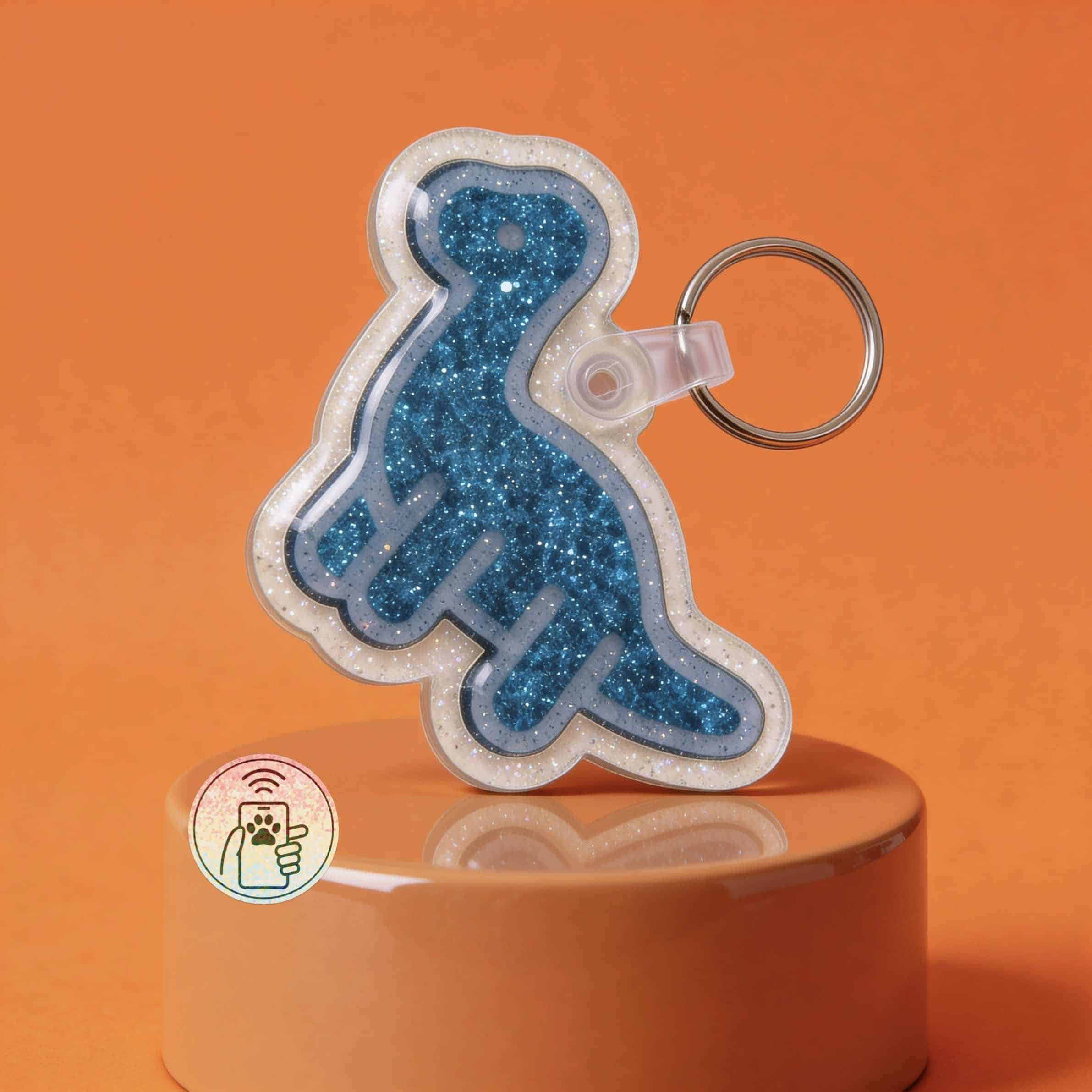 NFC pet ID tag in dinosaur shape with blue glitter finish for dogs and cats.