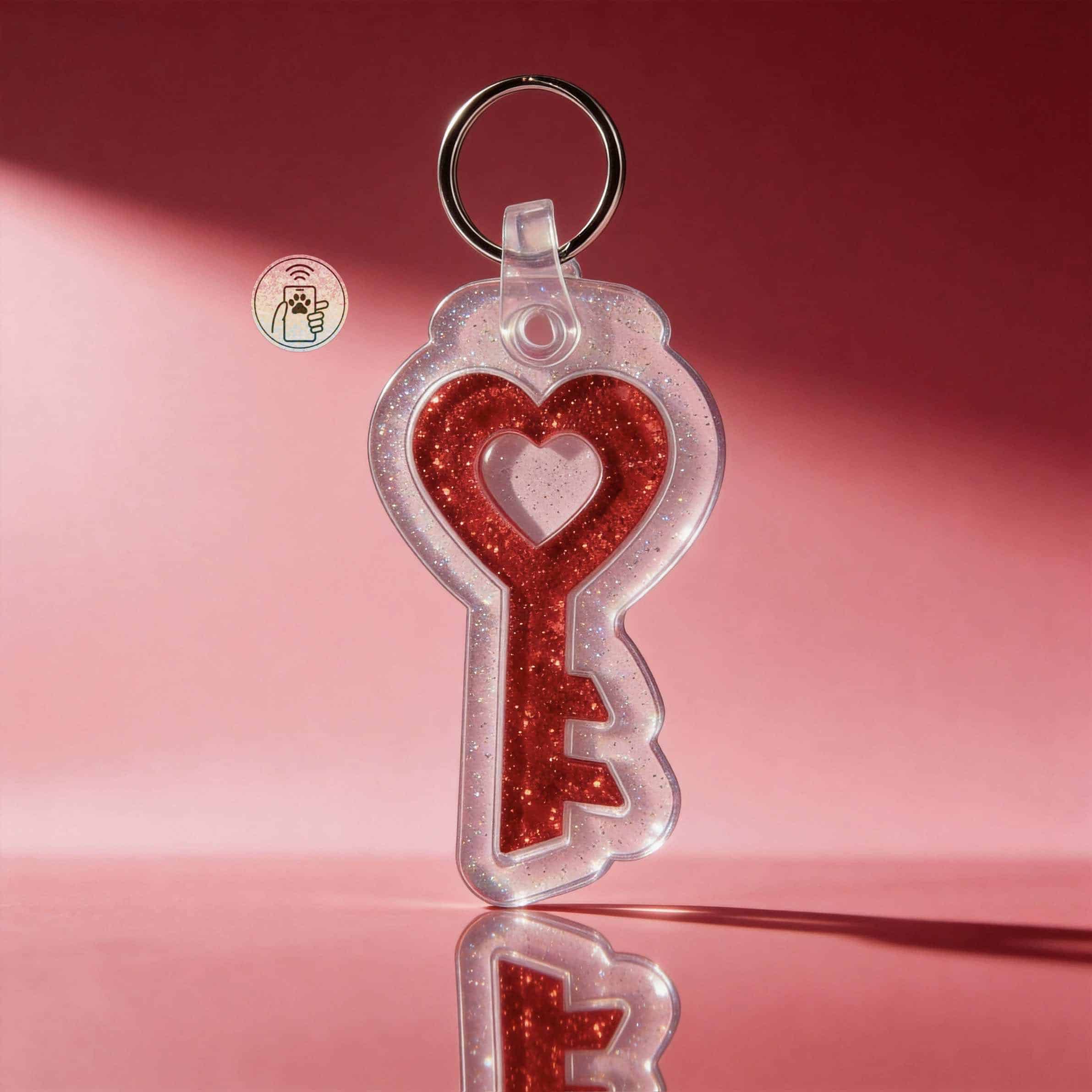 NFC pet ID tag featuring a heart and key design with glittery red accents, ideal for pet identificat.