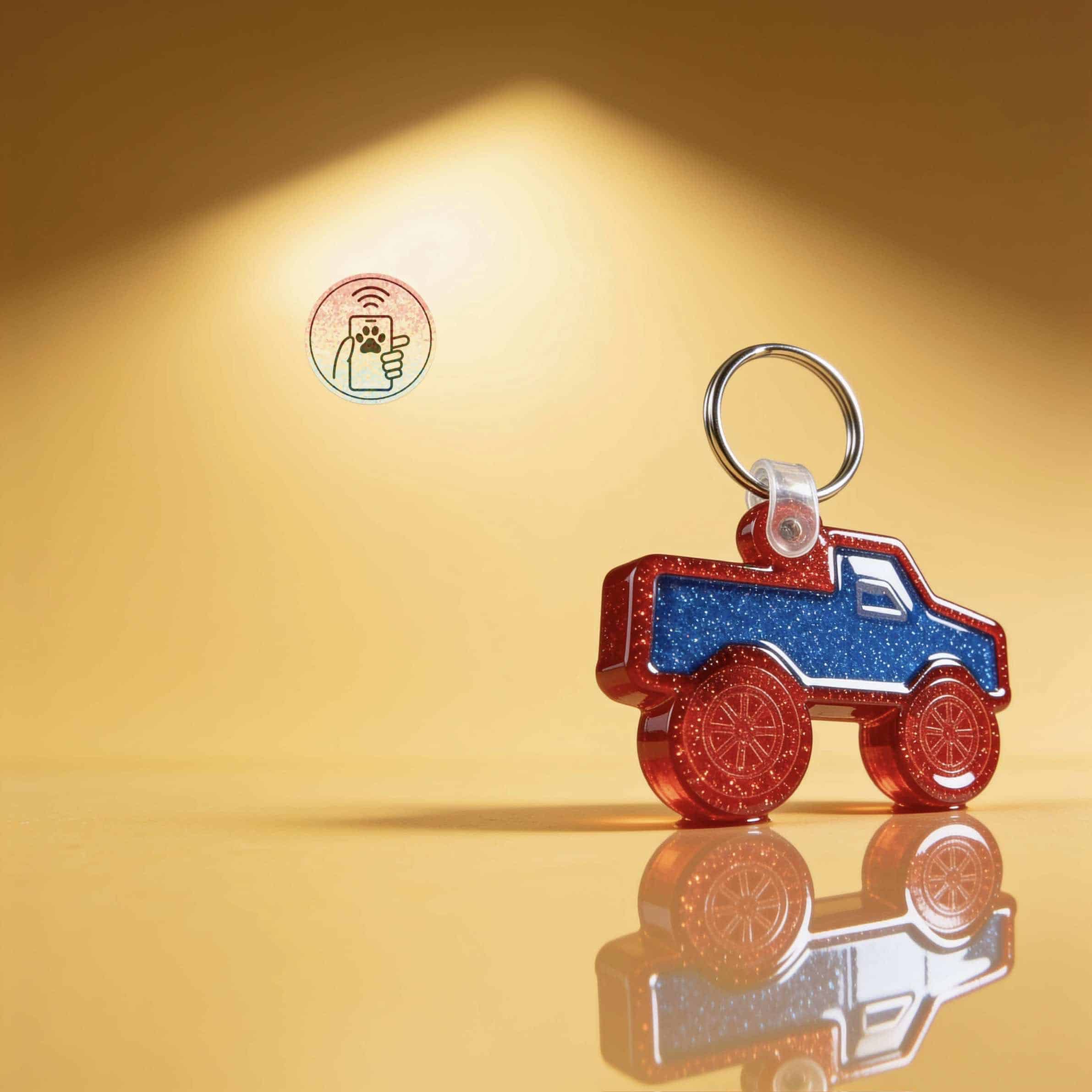 NFC-enabled pet ID tag shaped like a fire truck, perfect for dogs and cats.