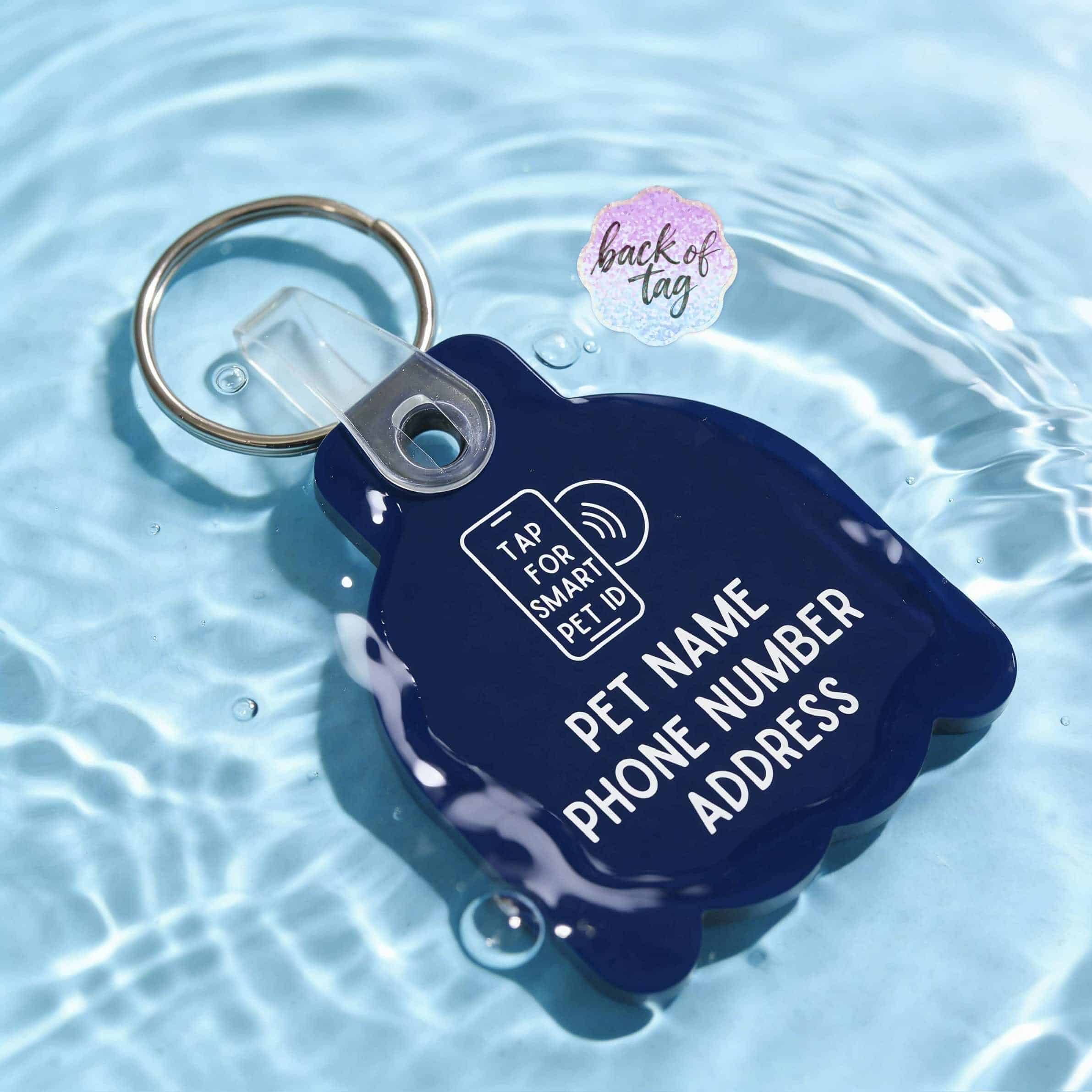 NFC pet ID tag floating in water, showcasing smart technology for pet safety — Shiloh's House smart NFC pet tag with free companion Lohji app.