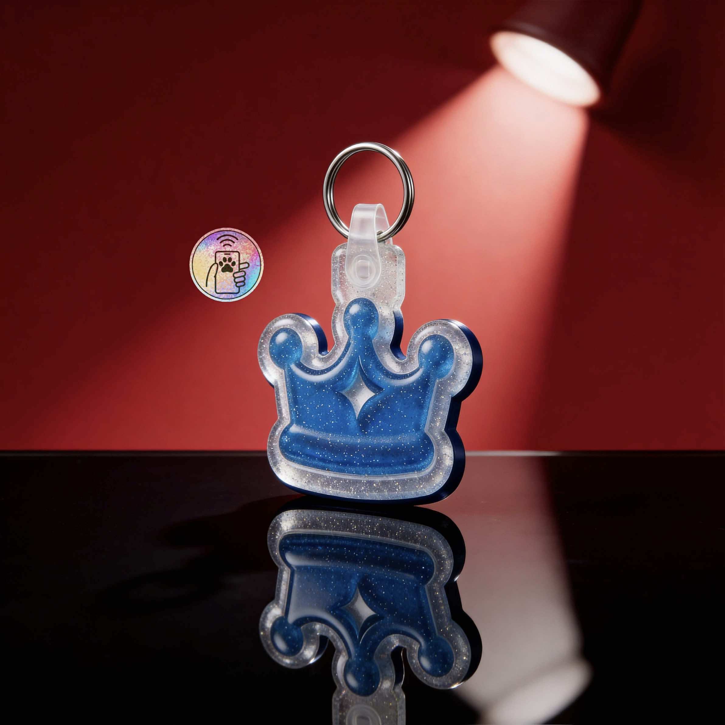 Blue glitter crown-shaped NFC pet ID tag with keyring for dogs and cats — Shiloh's House smart NFC pet tag with free companion Lohji app.