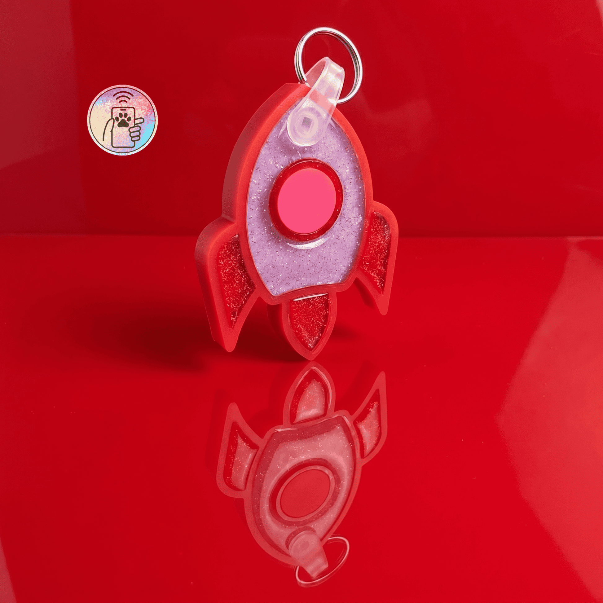 NFC pet ID tag shaped like a rocket in red and pink acrylic for dogs and cats — Shiloh's House smart NFC pet tag with free companion Lohji app.