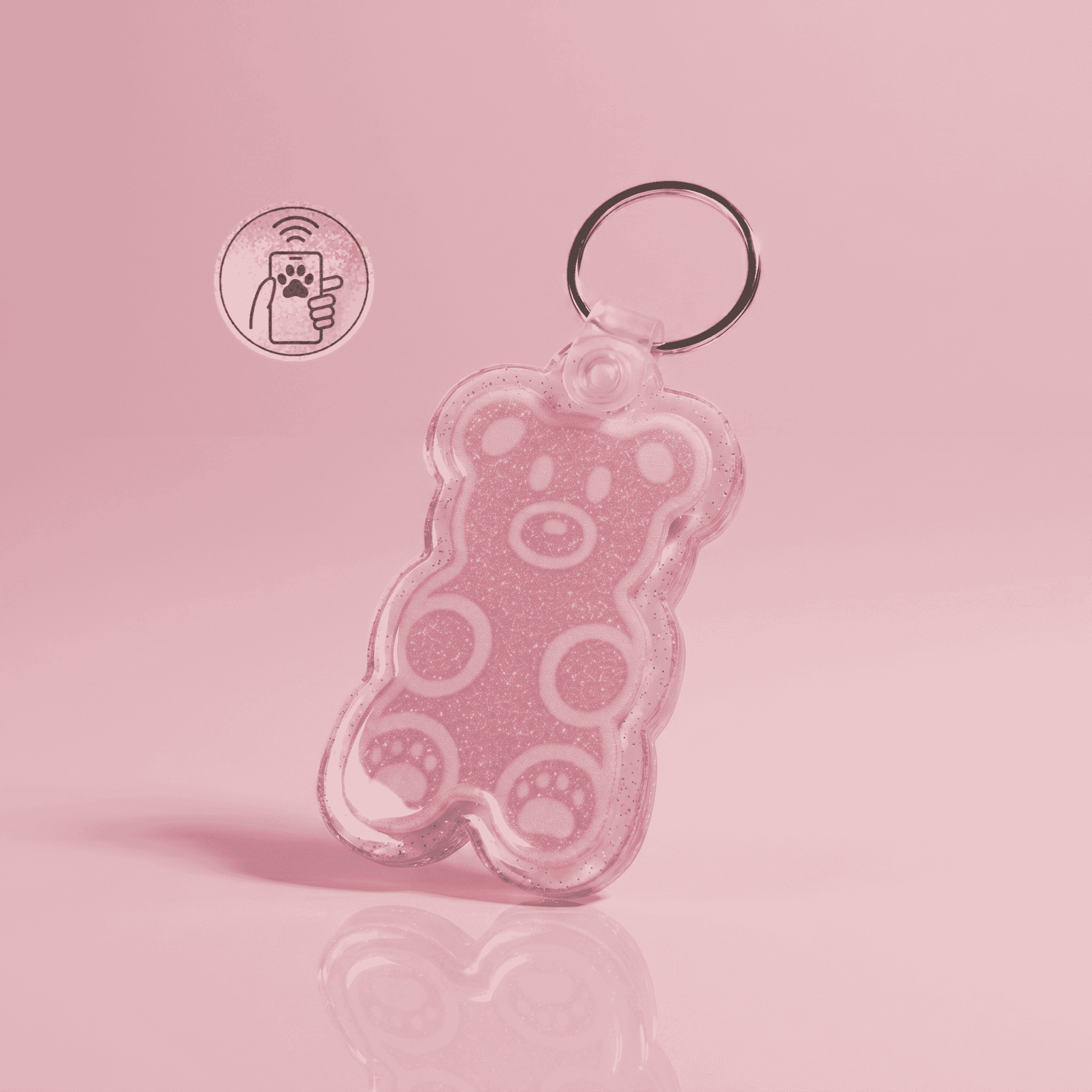 NFC pet ID tag in the shape of a pink bear with a keyring, perfect for dogs and cats — Shiloh's House smart NFC pet tag with free companion Lohji app.