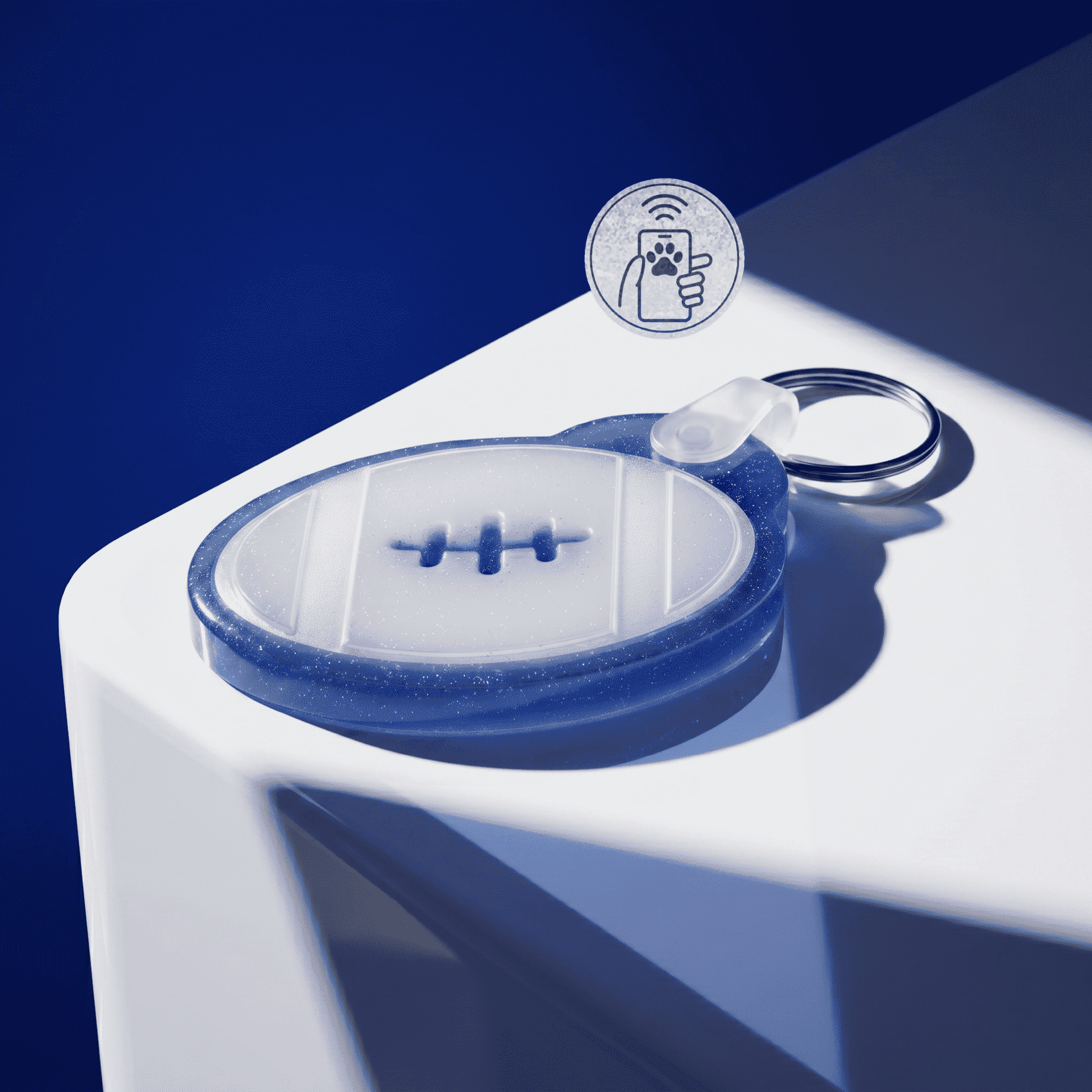 NFC pet ID tag in blue with a keyring, designed for dogs and cats, featuring a sleek, modern look — Shiloh's House smart NFC pet tag with free companion Lohji app.