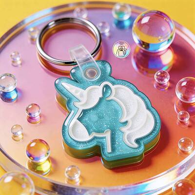 Unicorn-shaped NFC pet ID tag in turquoise with white mane for dogs and cats — Shiloh's House smart NFC pet tag with free companion Lohji app.