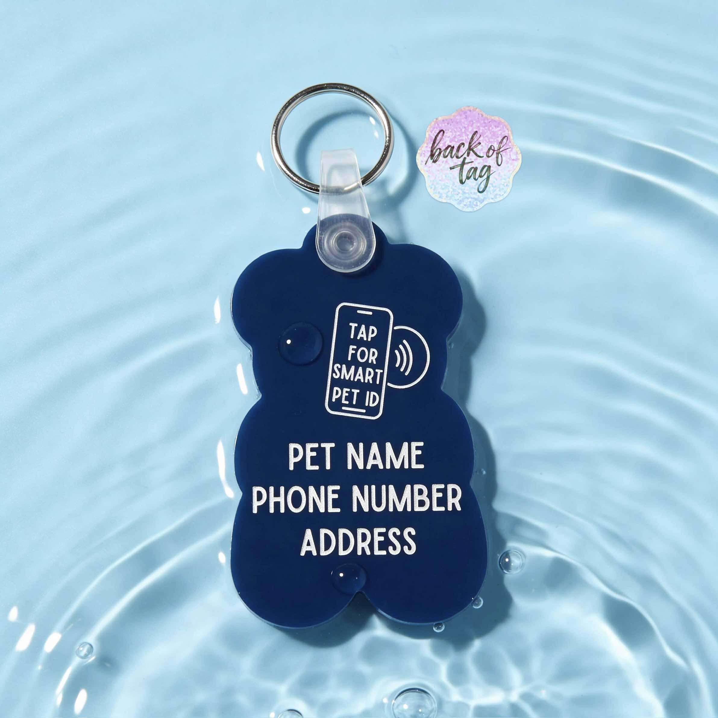 Blue bear-shaped pet ID tag with NFC chip for dogs and cats, waterproof and stylish.