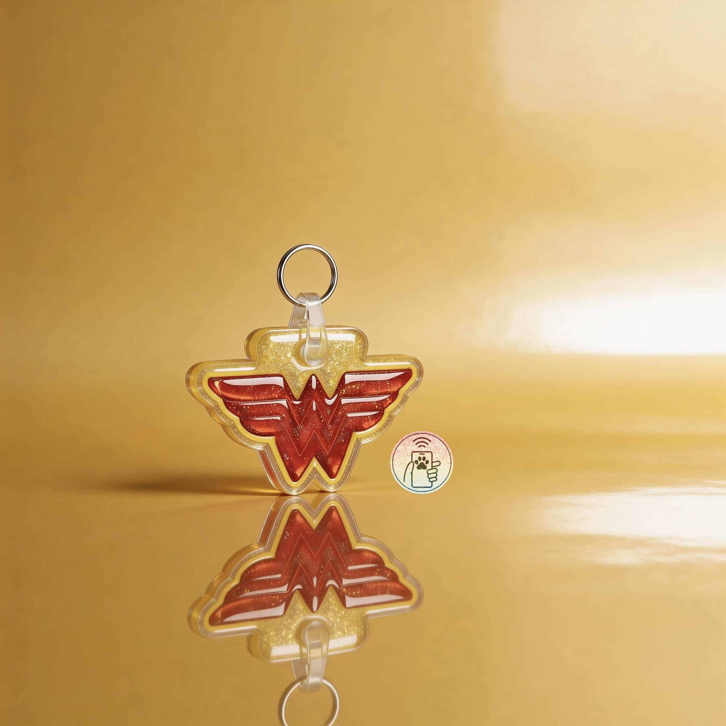 Acrylic Wonder Woman logo pet ID tag with keyring, designed for dogs and cats, featuring vibrant red — Shiloh's House smart NFC pet tag with free companion Lohji app.