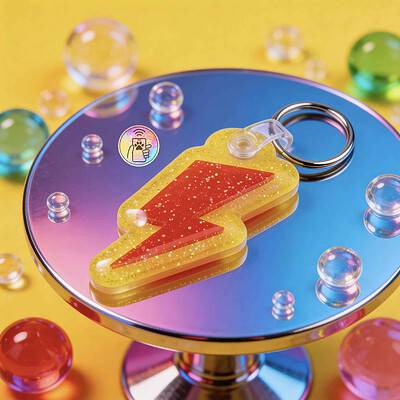 NFC pet ID tag shaped like a lightning bolt, designed for dogs and cats, with vibrant colors and dur — Shiloh's House smart NFC pet tag with free companion Lohji app.