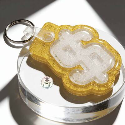Gold glitter pet ID tag in dollar sign shape with NFC chip for dogs and cats — Shiloh's House smart NFC pet tag with free companion Lohji app.