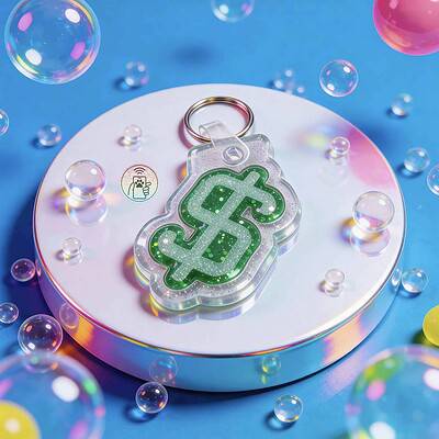 NFC pet ID tag in green dollar sign shape on a white circular platform with colorful bubbles — Shiloh's House smart NFC pet tag with free companion Lohji app.