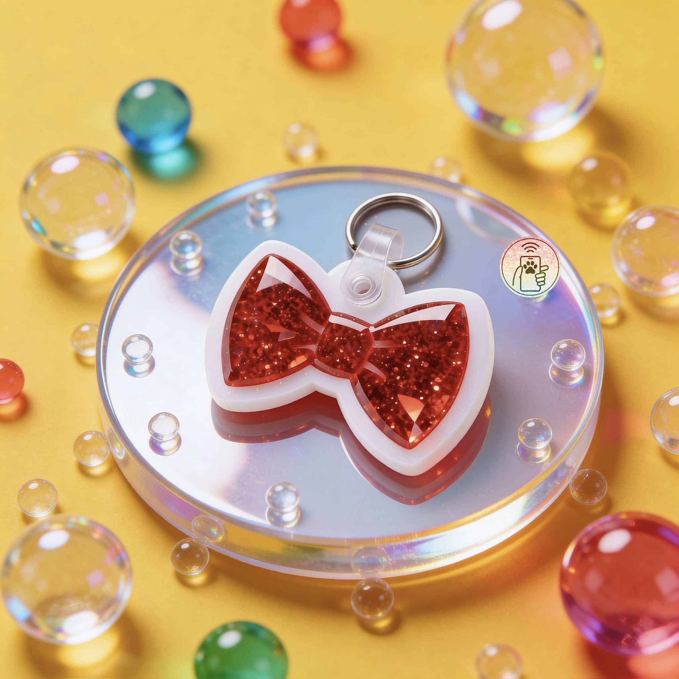 Red glitter bow-shaped NFC pet ID tag for dogs and cats — Shiloh's House smart NFC pet tag with free companion Lohji app.