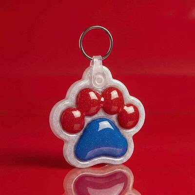 Paw-shaped NFC pet ID tag with red and blue acrylic, designed for dogs and cats. Perfect for safety — Shiloh's House smart NFC pet tag with free companion Lohji app.
