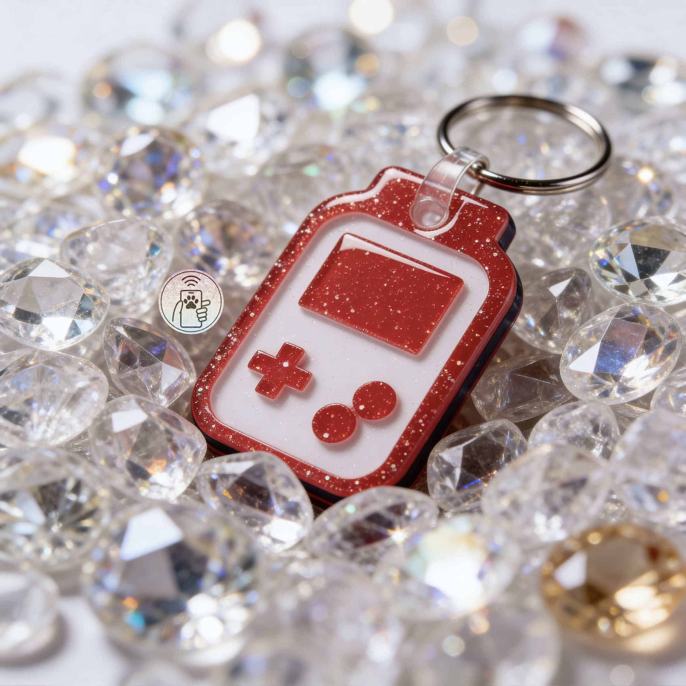 NFC pet ID tag shaped like a game controller with glittery red and white design, perfect for dogs an — Shiloh's House smart NFC pet tag with free companion Lohji app.