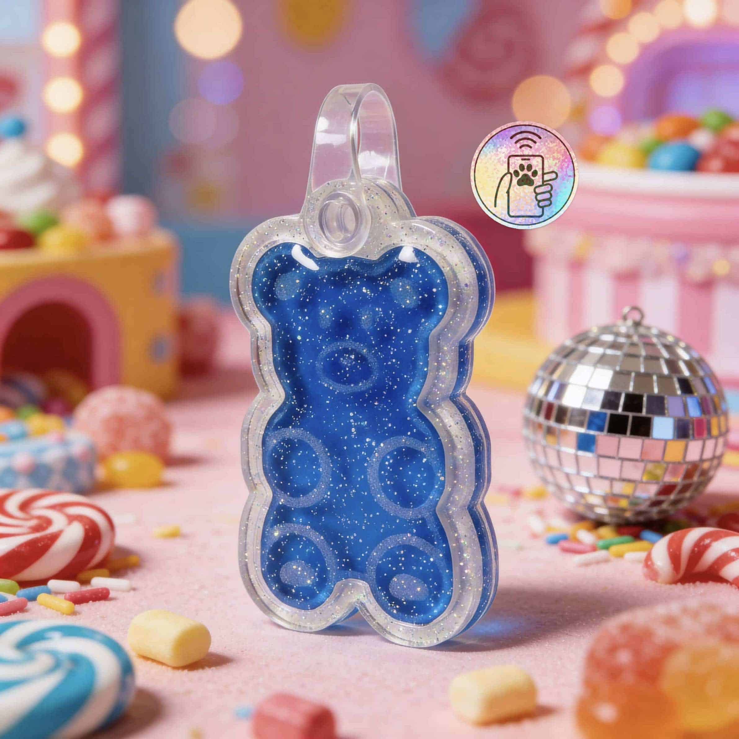 Blue gummy bear-shaped NFC pet ID tag with smart technology for dogs and cats.