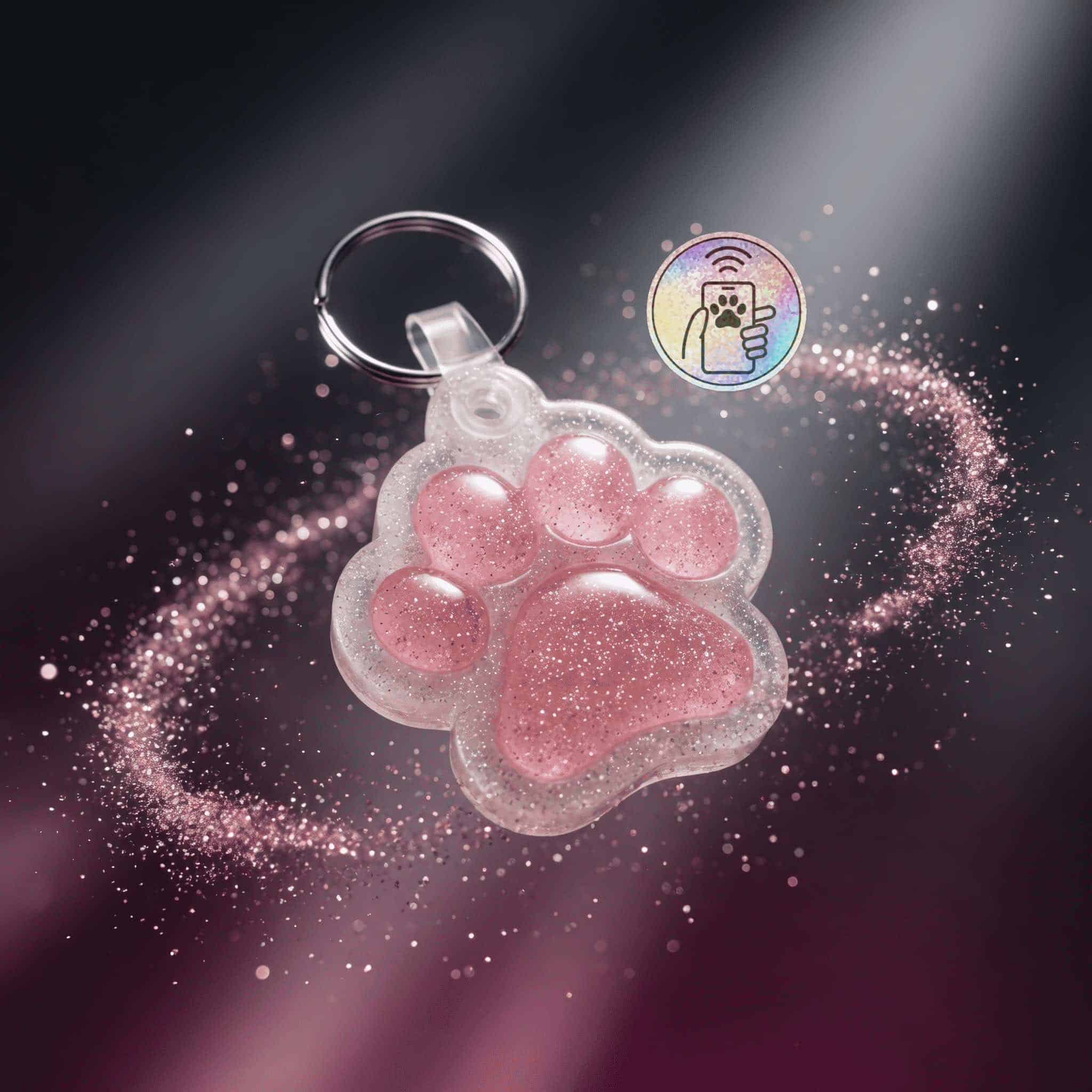 Pink glitter paw-shaped NFC pet ID tag with keyring for dogs and cats.