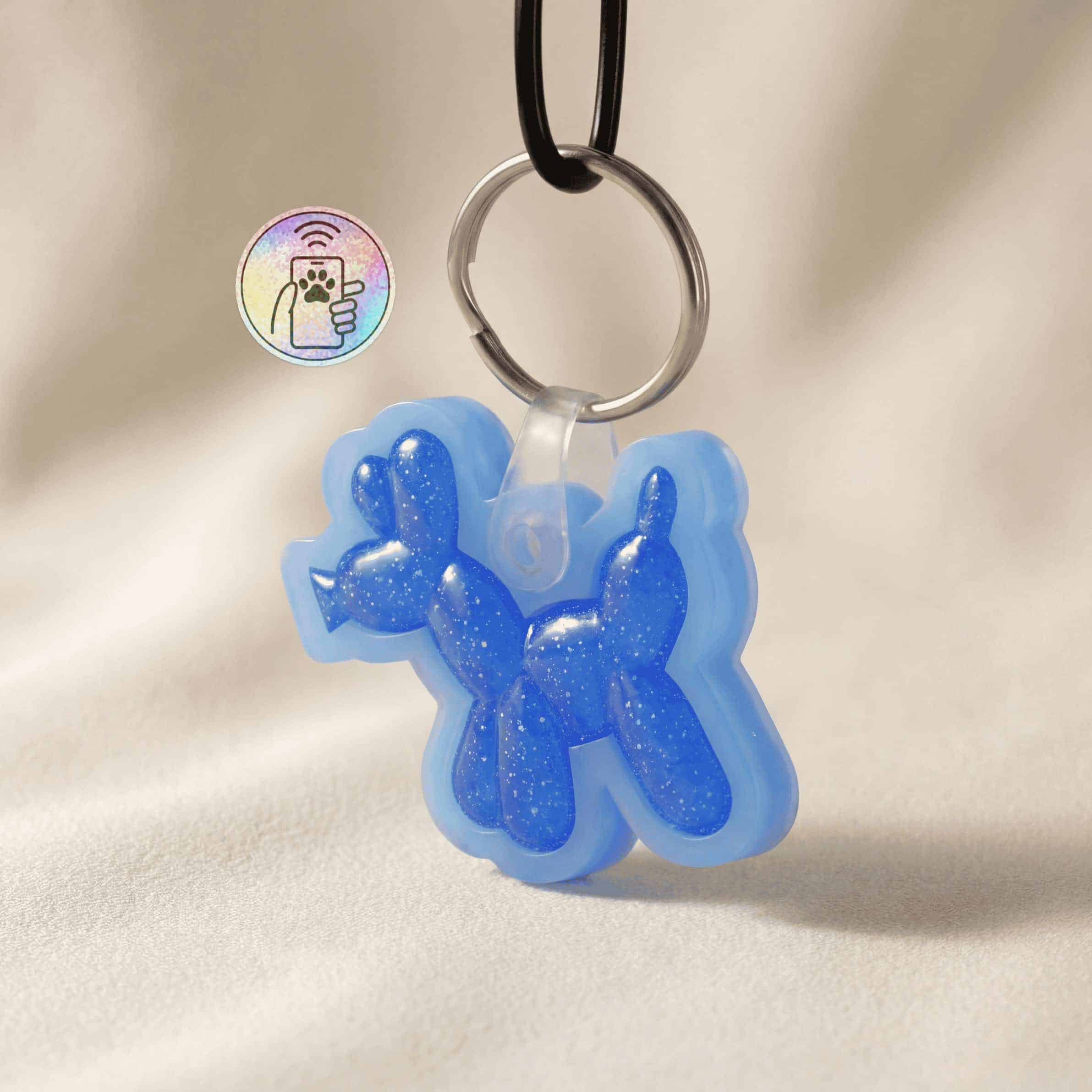 Blue glitter dog tag shaped like a dog, with NFC smart chip for pet ID.