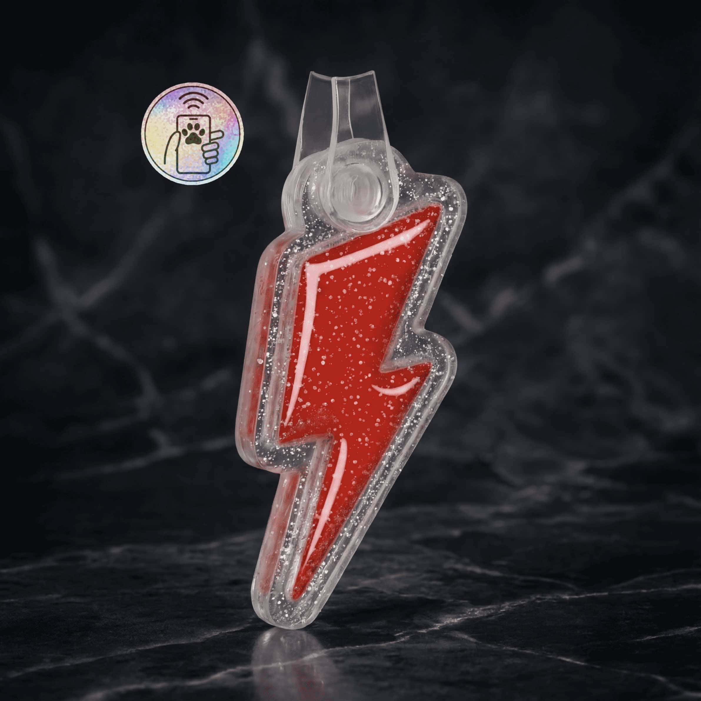 NFC pet ID tag shaped like a lightning bolt, made of clear acrylic with red lightning design.