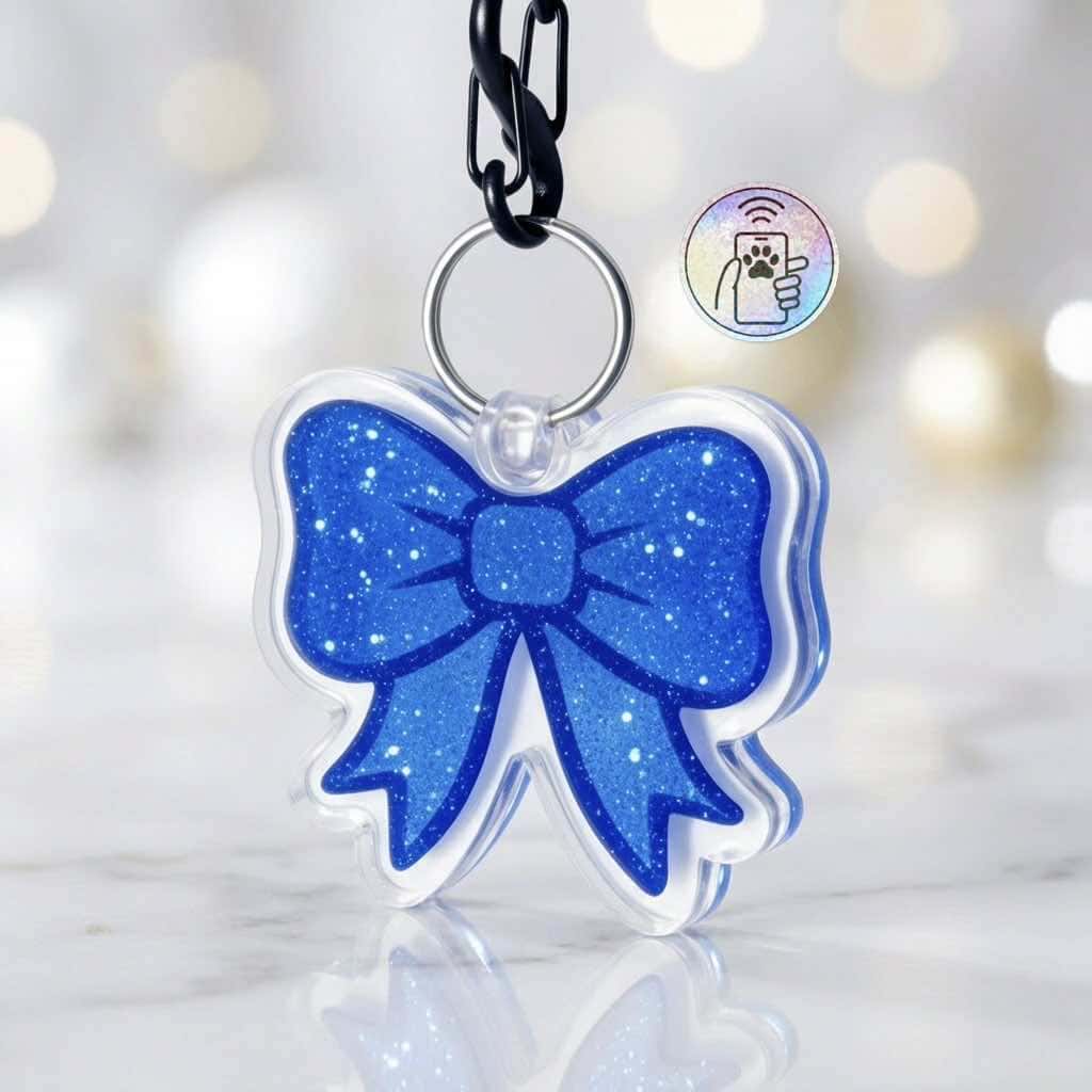 NFC pet ID tag in the shape of a blue glittery bow, designed for dogs and cats.