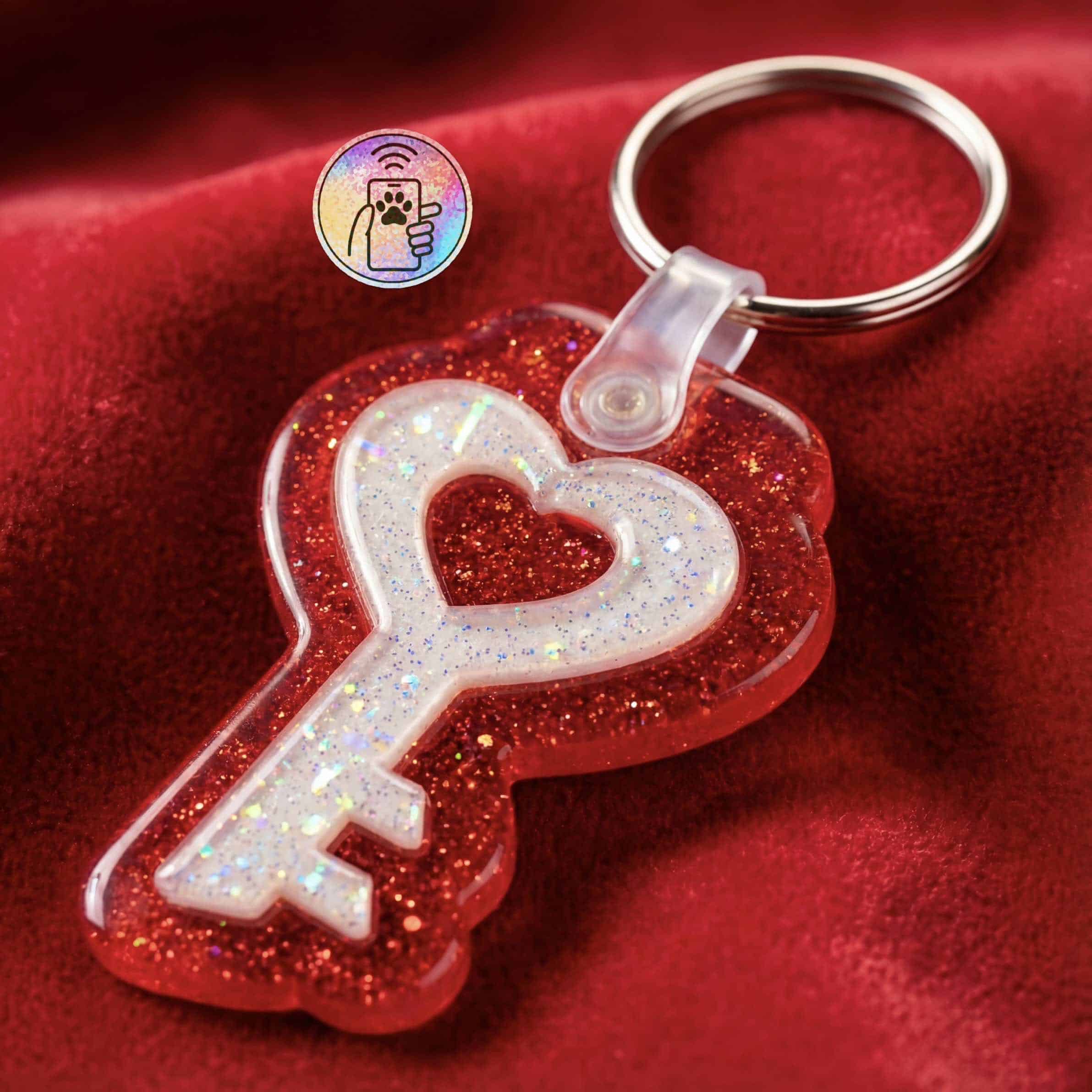 NFC-enabled pet ID tag in a heart shape with glitter and female symbol for dogs and cats.