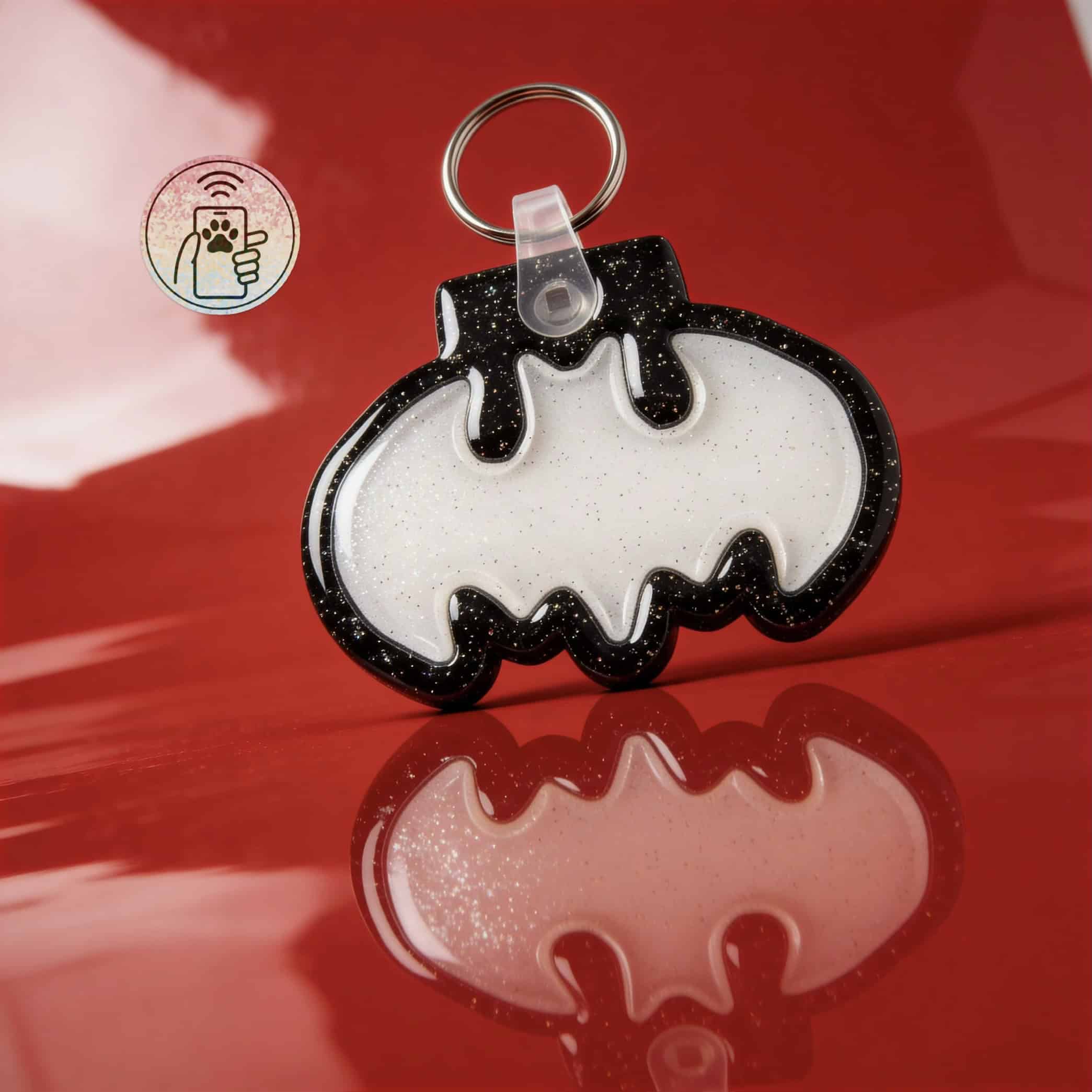 NFC pet ID tag in bat shape with glitter details, perfect for dogs and cats.