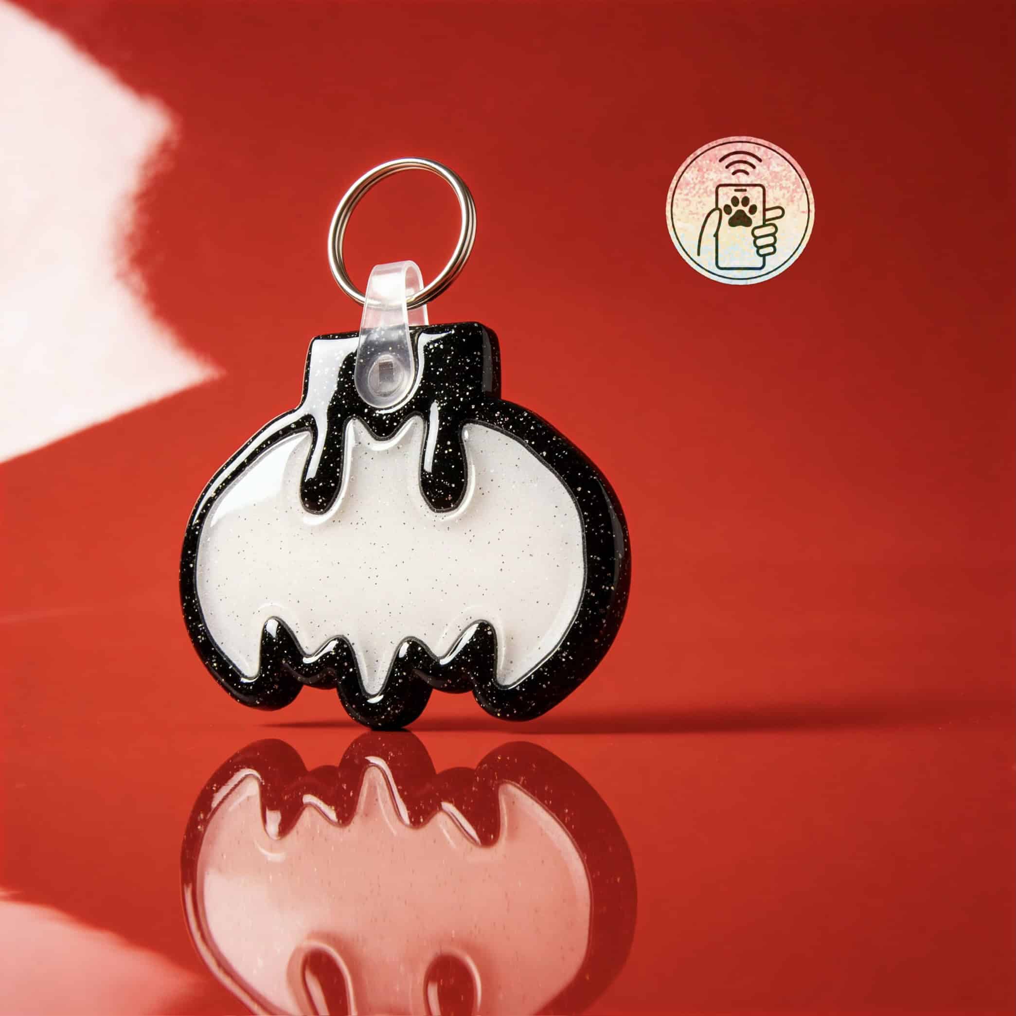 Designer acrylic Batman-shaped NFC pet ID tag for dogs and cats.