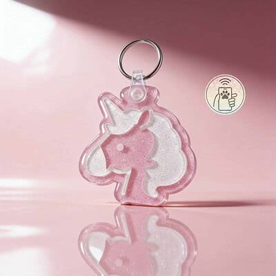 Unicorn-shaped NFC pet ID tag with glitter in pink and white, designed for dogs and cats.