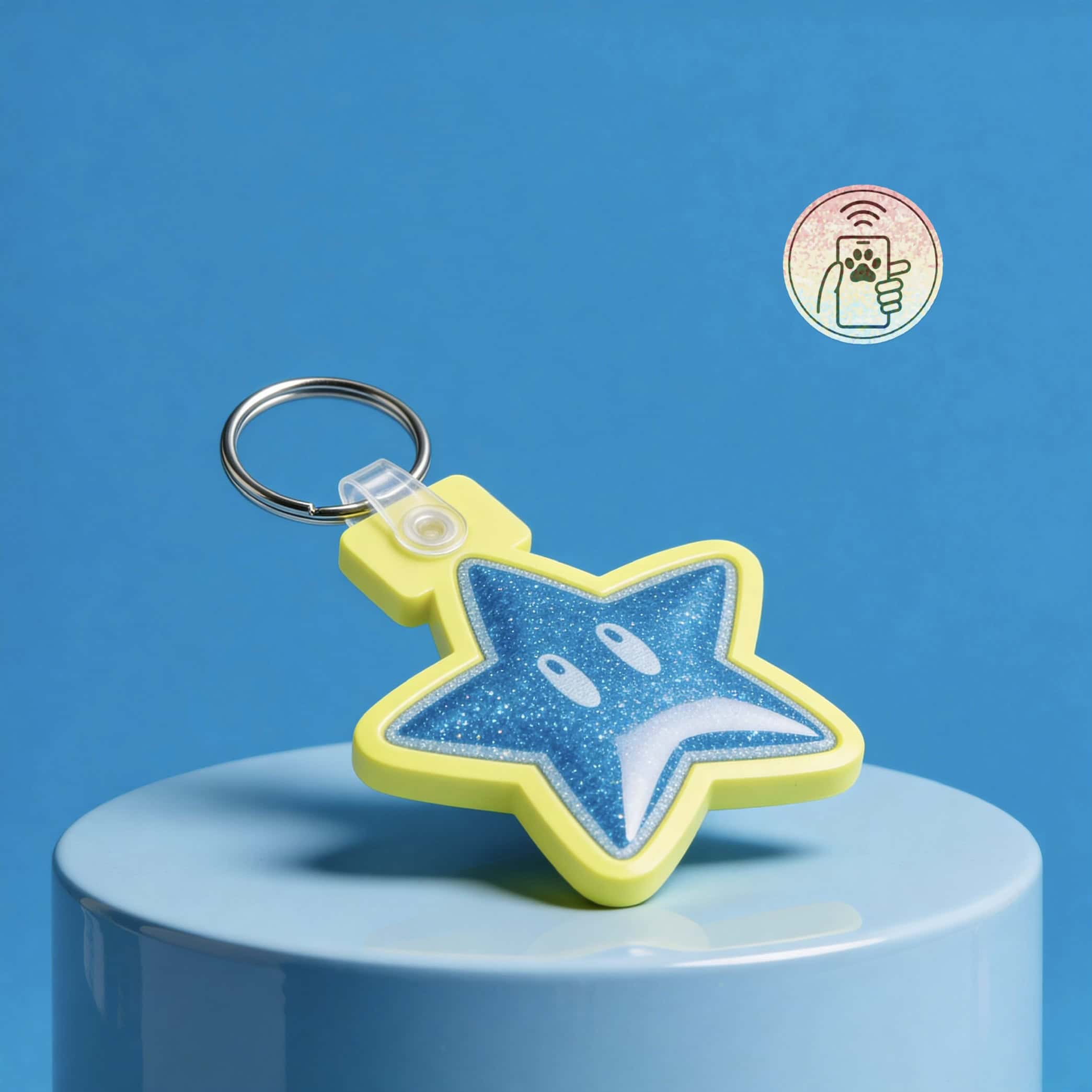 Blue star-shaped pet ID tag with glitter, attached to a keychain, on a blue background.