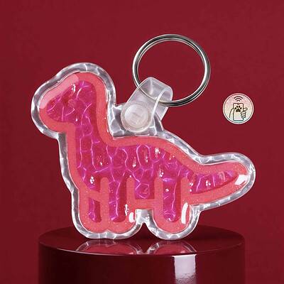 Bright pink dinosaur-shaped NFC pet ID tag with LED lights for dogs and cats.